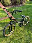Rower BMX Mafiabikes Kush2+ black gold koło 20 pegi wyczynowy