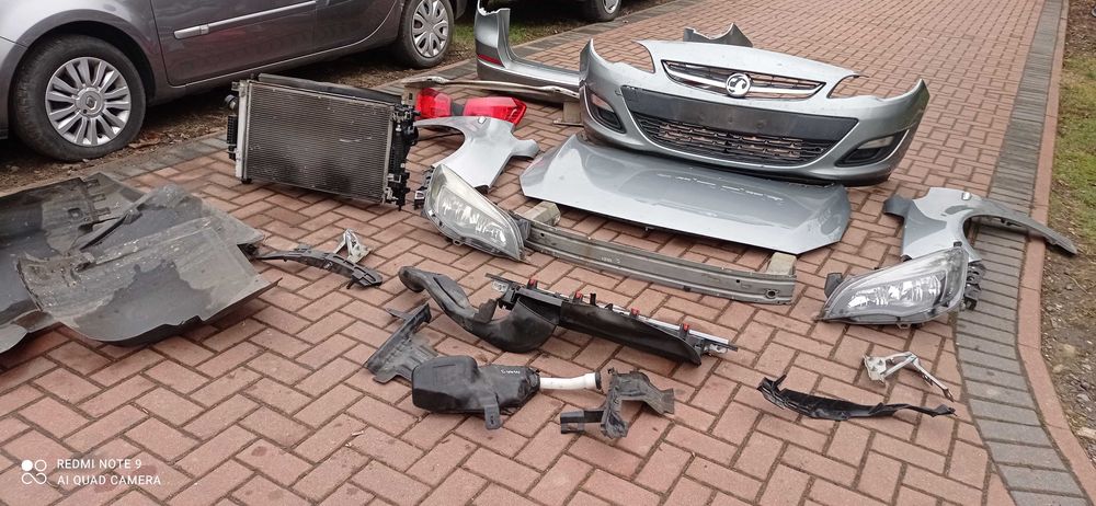Opel Astra J IV Z179 BŁOTNIK maska pas chłodnica belka reflektor