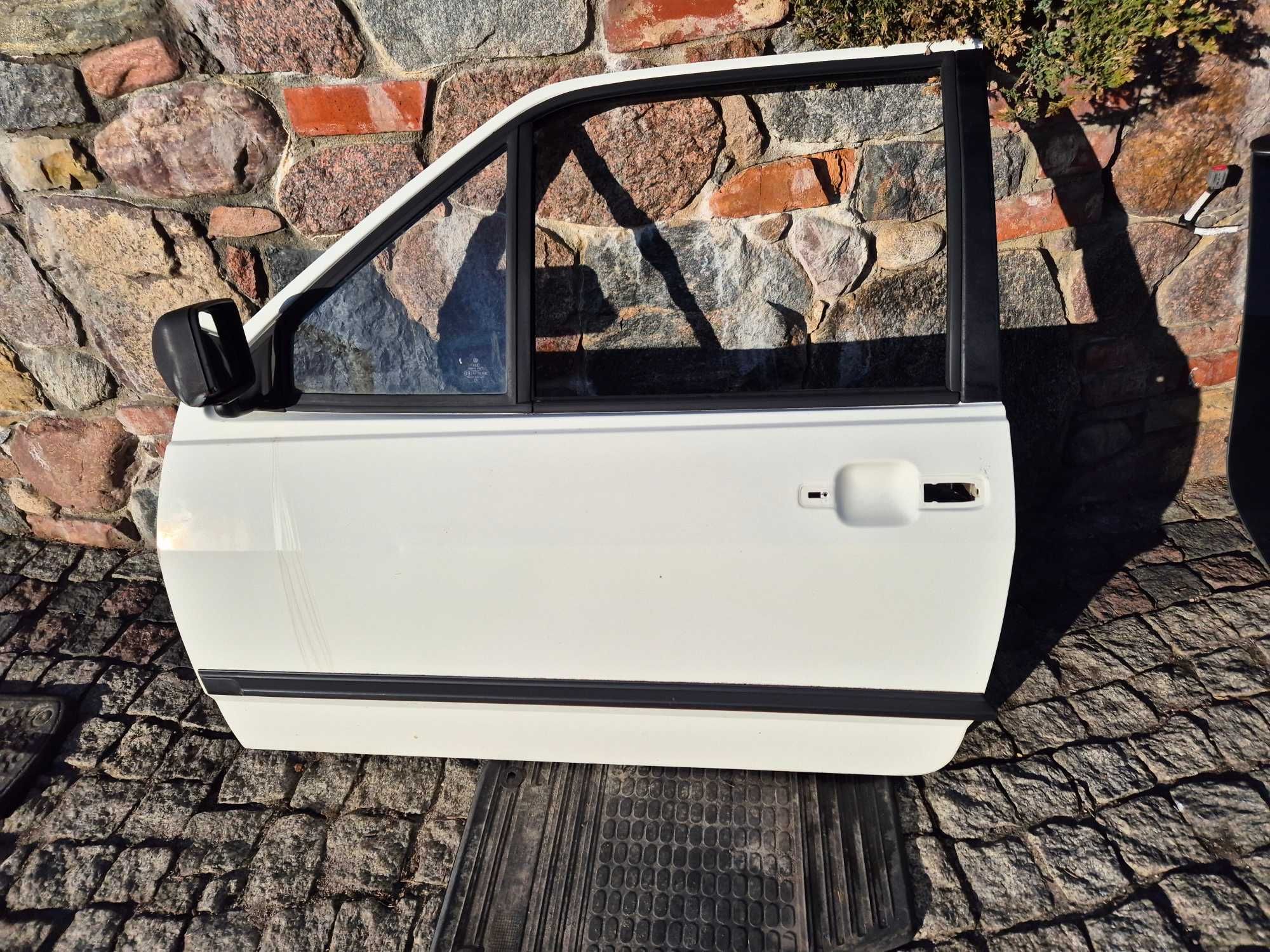 drzwi przednie lewe lewy przód vw polo II coupe 3 drzwi oryginał igła