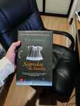 Vendo o livro "Segredos da Família"