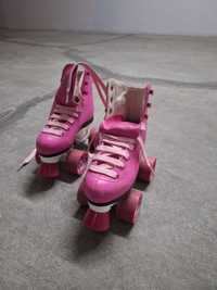 Patins cor de rosa criança