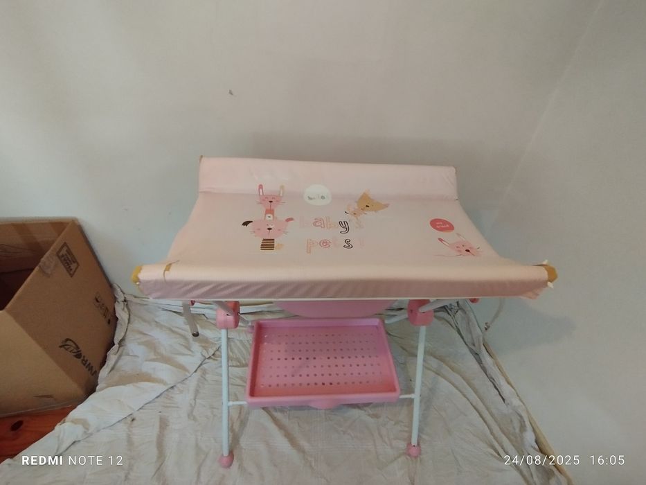 Muda Fraldas com banheira