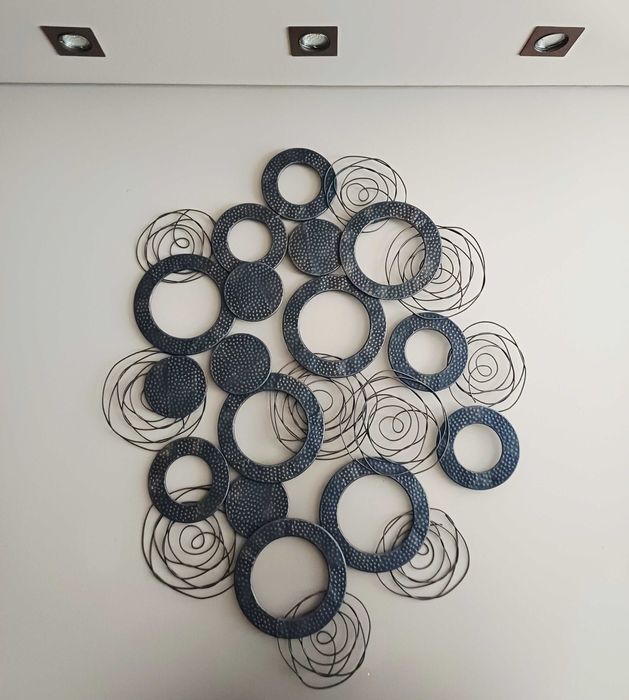 Peça decorativa metálica