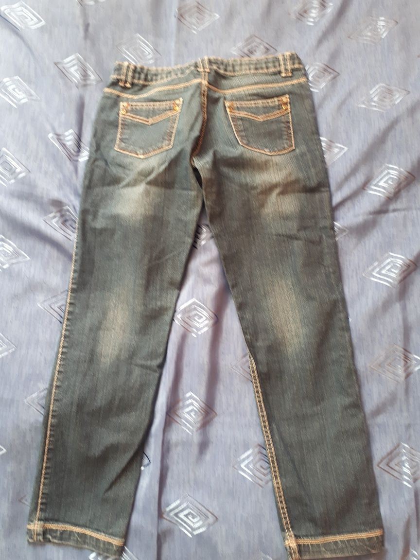 Extra długie spodnie jeansy z haftem 152 cm