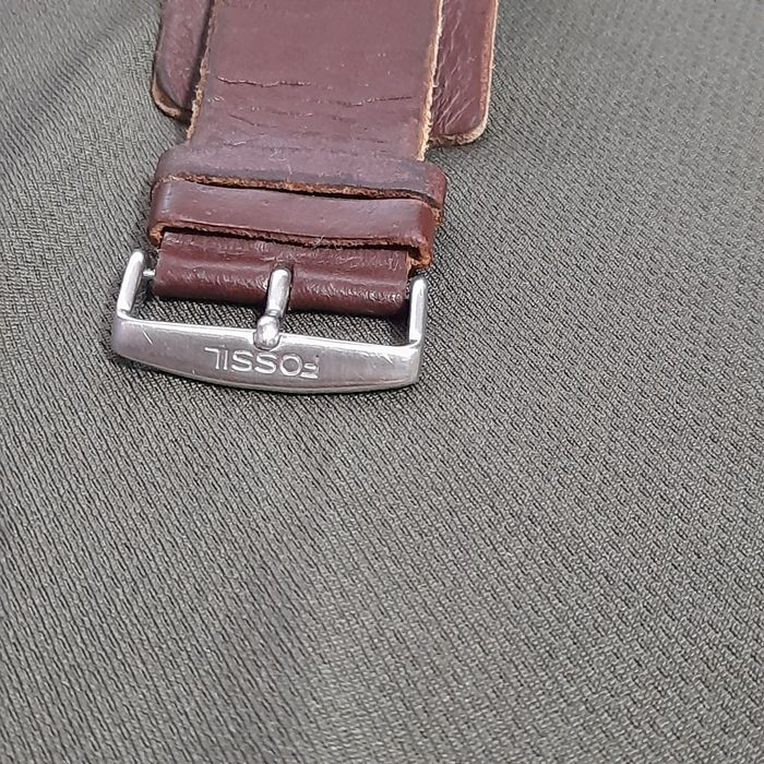 Часы FOSSIL  карта мира.