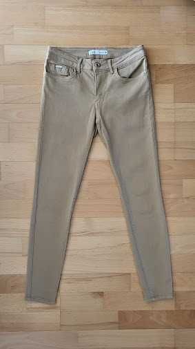 Spodnie damskie elastyczne jeansy skinny ze średnim stanem Zara r. 38