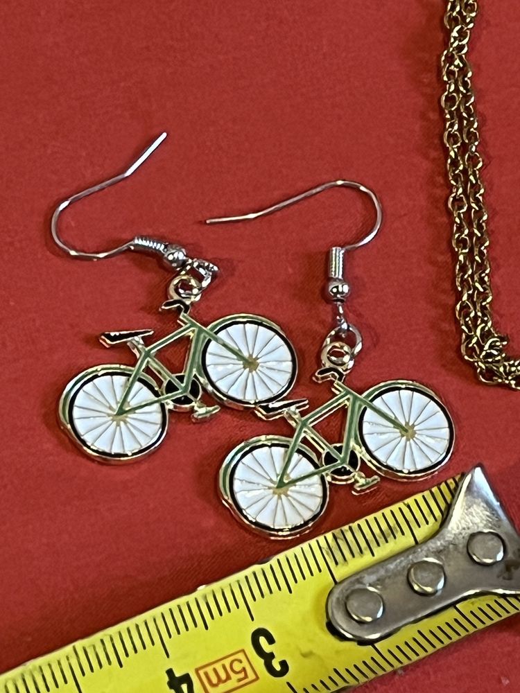 Zestaw biżuterii kolczyki rowery i wisior zachody słońca