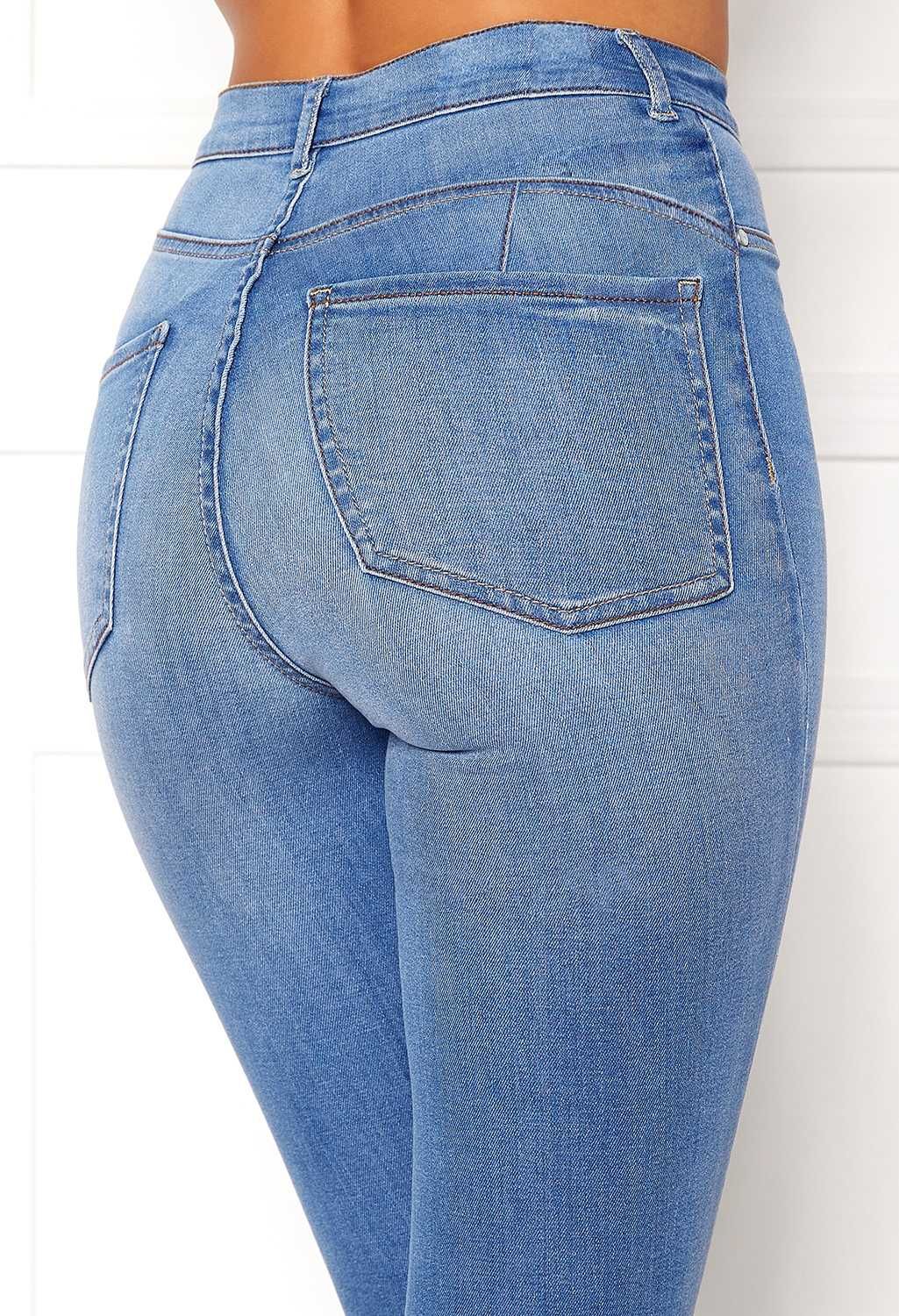 Spodnie wyszczuplające klasyczne push up wysoki stan jasny jeans