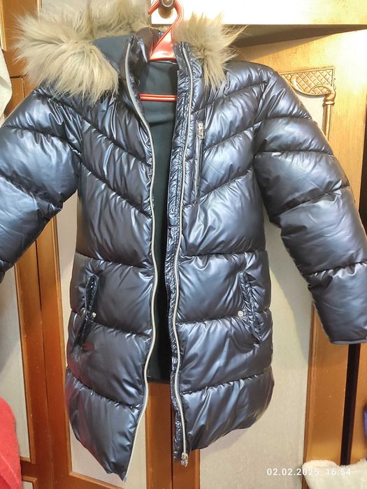 Пуховик,стан нового,теплий 140-145