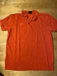 czerwona koszulka polo umbro