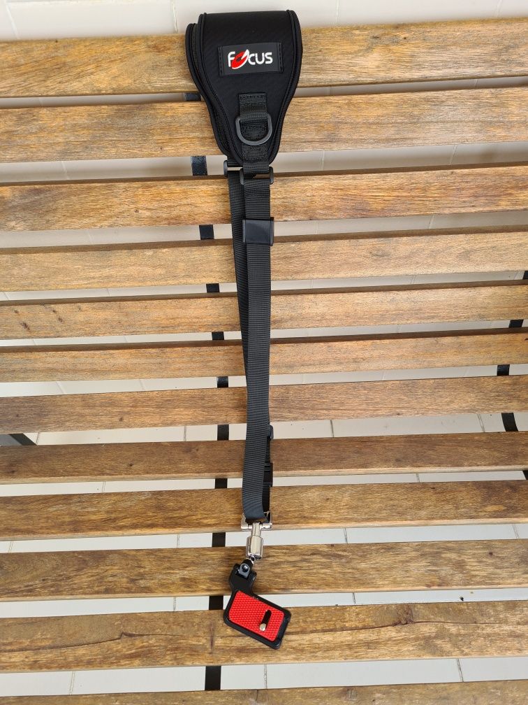 Cinta de ombro para maquinas fotográficas.