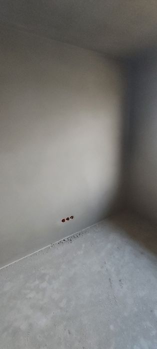 Tynki maszynowe cementowo wapienne