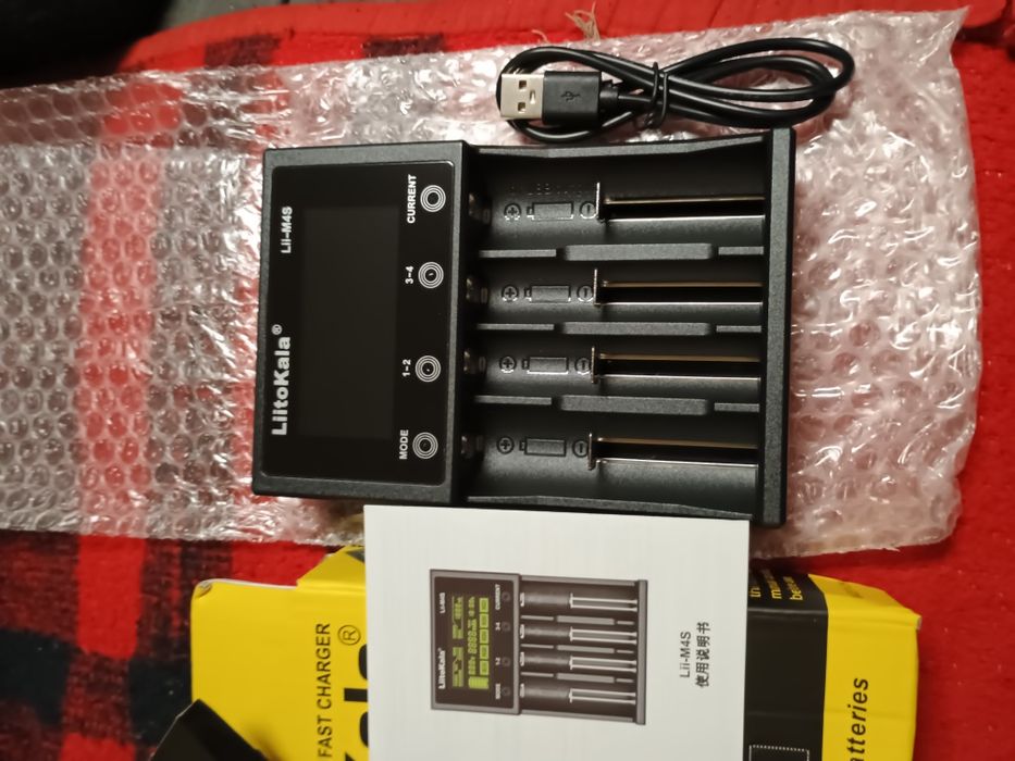 Зарядка литокала, состояние новое.