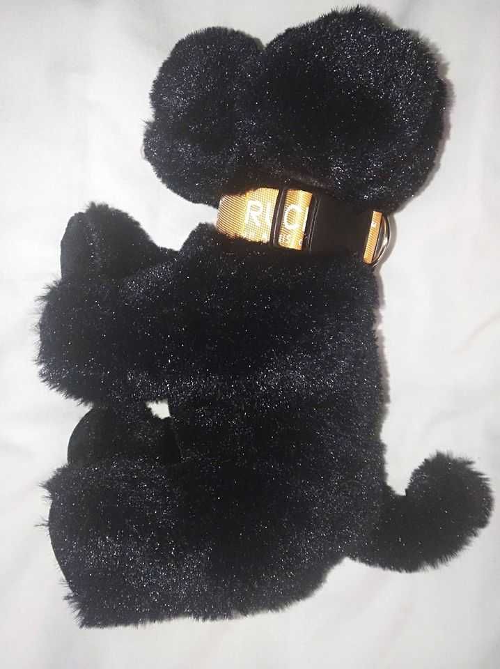 Pequeno cão preto peluche novo. 25x15cm