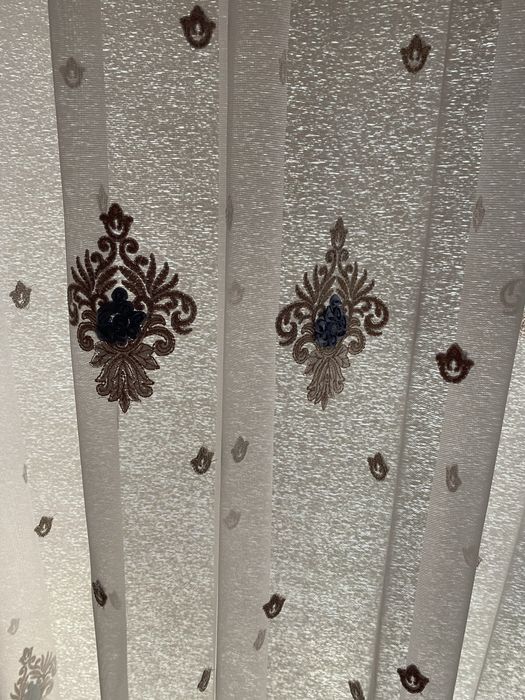 Тюль, штори та покривало з подушками