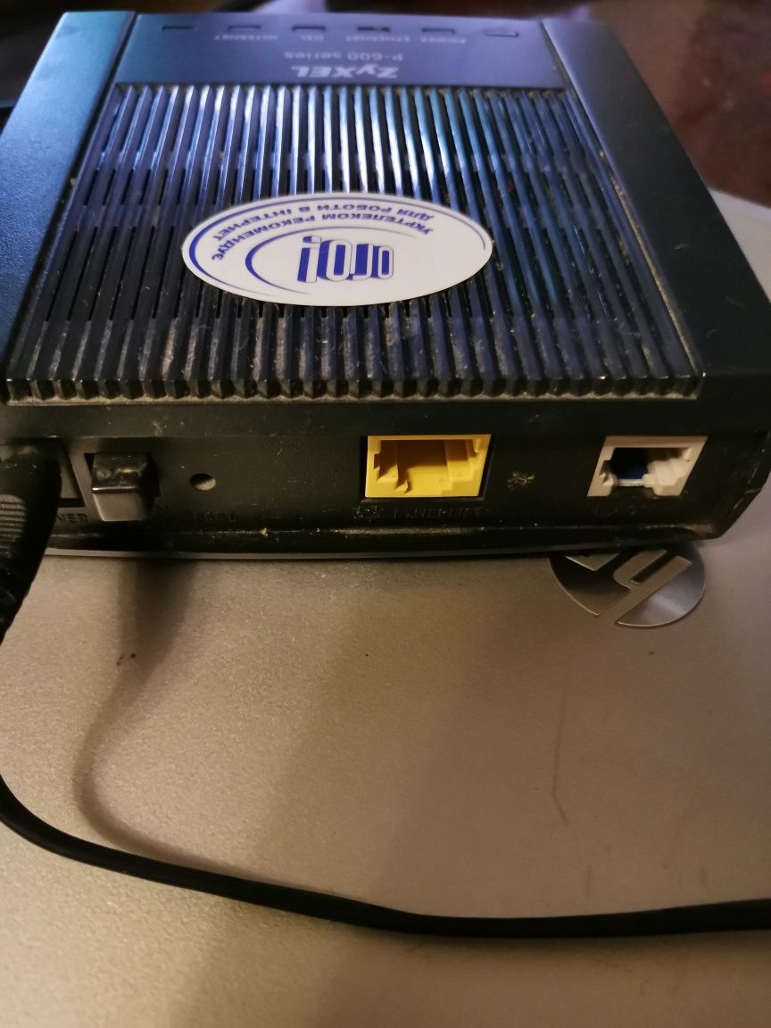 Модем Zuxel P-600 та Arris TG715X