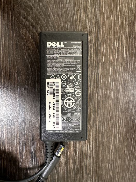 Блок живлення Dell-0NX061 (LA65NS2-00)