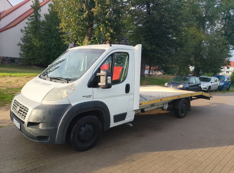 Pomoc drogowa holowanie autolaweta  transport aut  24h kraj zagranica