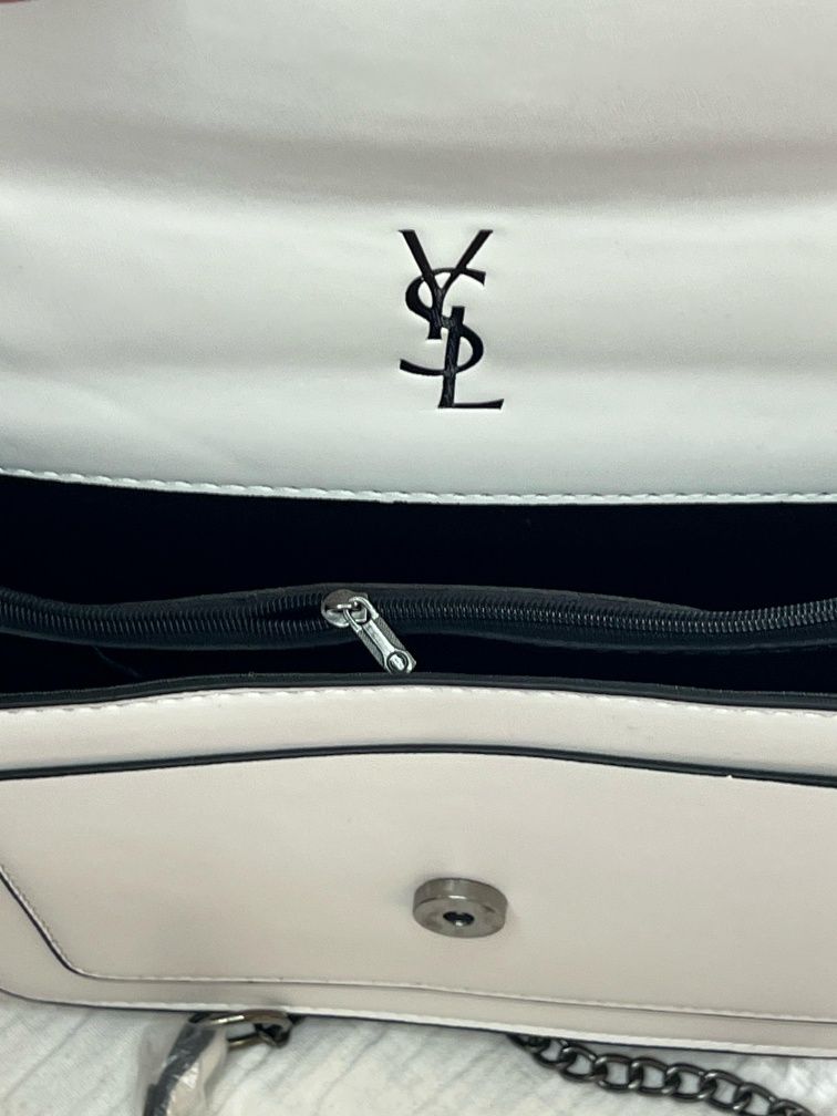 Mochila ysl mulher