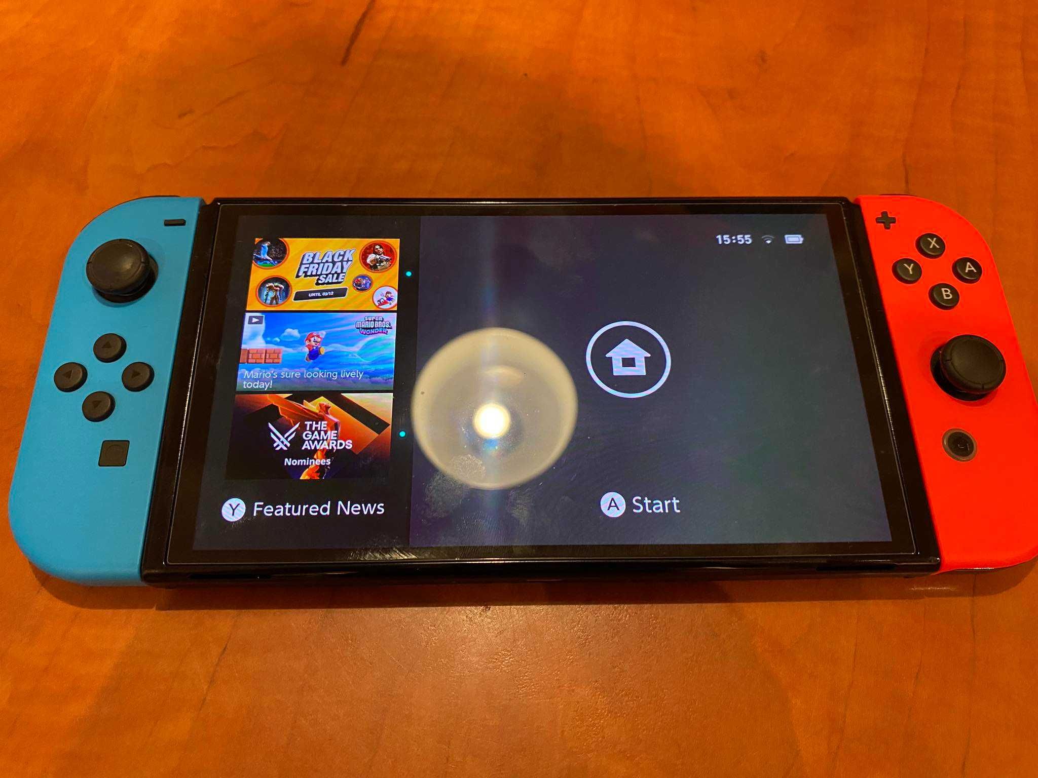 Konsola Nintendo Switch (model OLED) + Dodatki (karta SD i pokrowiec)