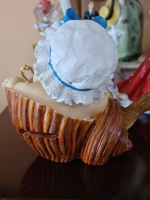 Skarbonka dziecko w muszli