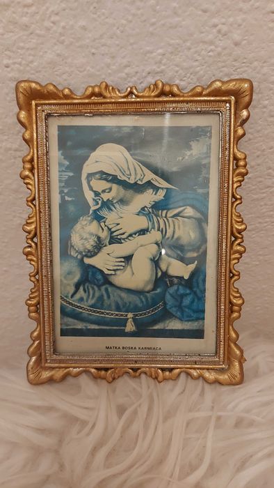 Obrazek stary Matka Boska karmiąca.