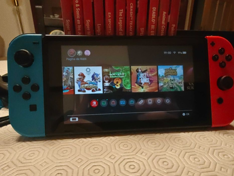 Nintendo Switch Consola + Caixa + Bolsa + Grip + Jogos