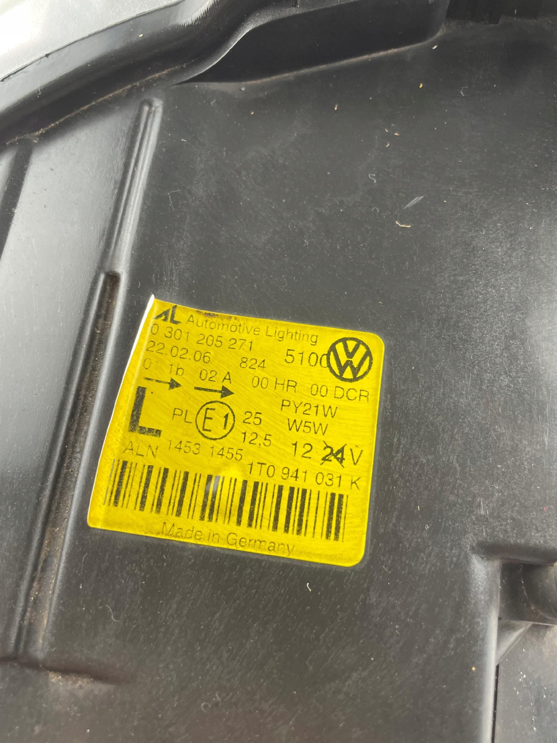 VW TOURAN I CADDY lampa przednia lewa xenon