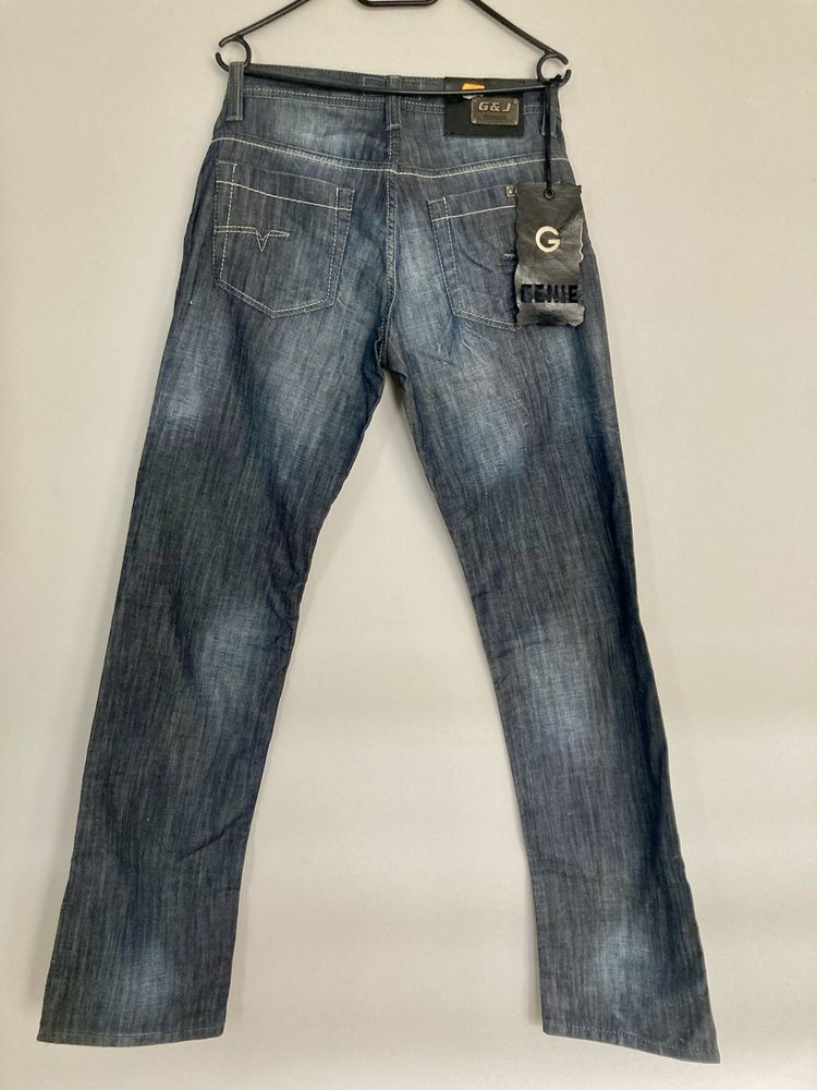 Nowe spodnie jeansowe męskie W29/L34