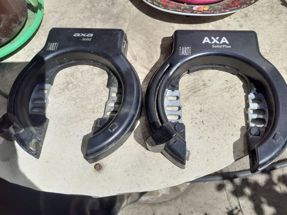 Продаю два замка на задне колесо велосипеда АXA, без ключів та зломані