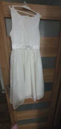 Elegancka biała sukienka 146