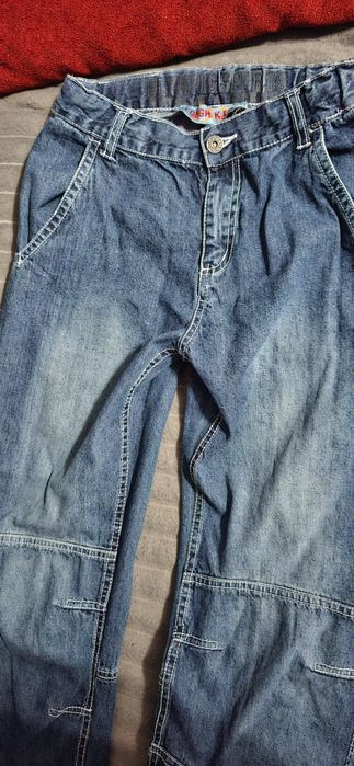 Spodnie jeans 164