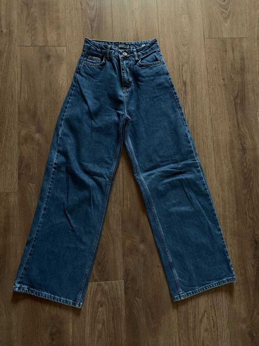 Широкі жіночі джинси