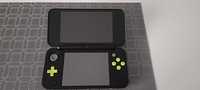 New Nintendo 2ds XL w kolorze czarno-zielonym 

Konsola jest w stanie