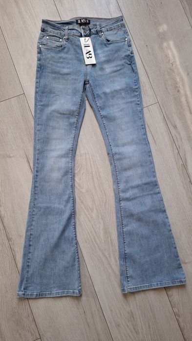 Jeansy damskie dzwony rozmiar M
