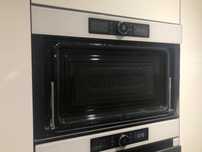Kuchenka mikrofalowa Whirlpool AMW 730 WH - uszkodzona obudowa