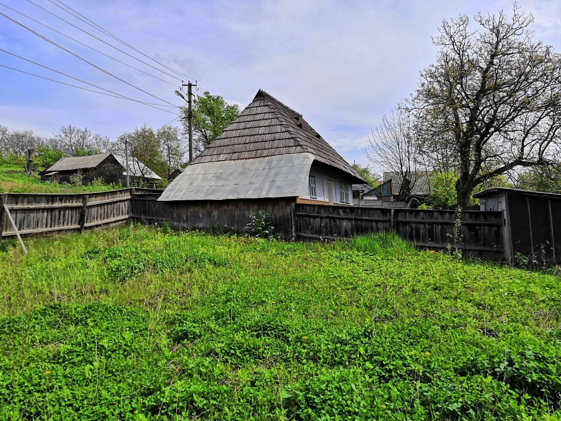 Продам ділянку з будинком