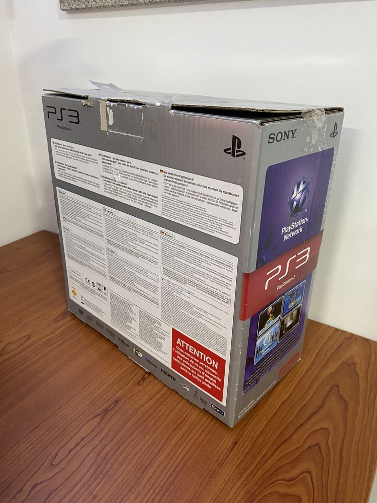 Playstation 3 Slim + 2 comandos + 8 jogos