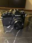 Câmara fotográfica antiga Nikon