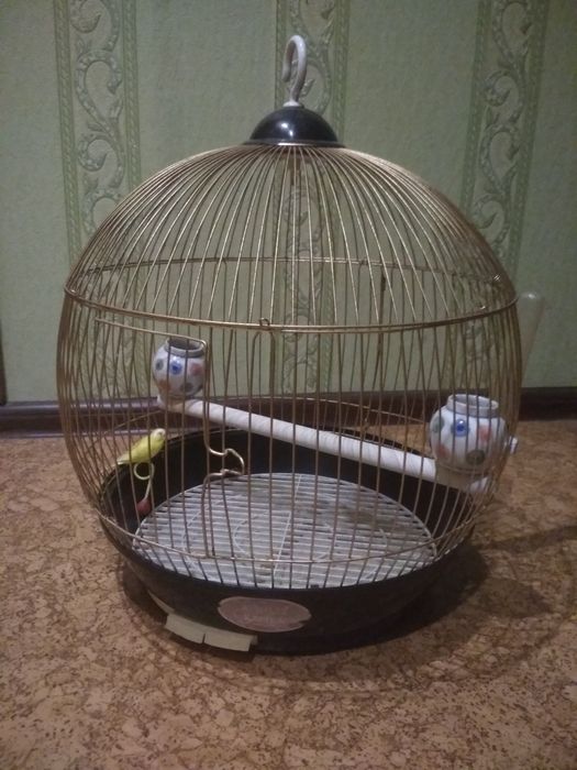 клітка для папуги з бачонками для корму. Вартість 390грн + комісія