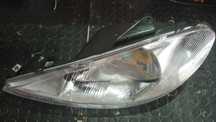 Óptica esquerda peugeot 206/99