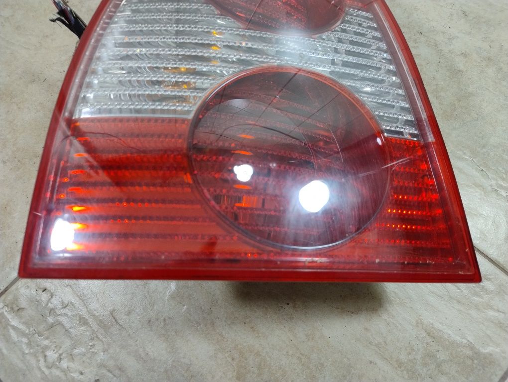 VW Volkswagen Passat B5 lift sedan Europa lampa lewy tył wysyłka OLX