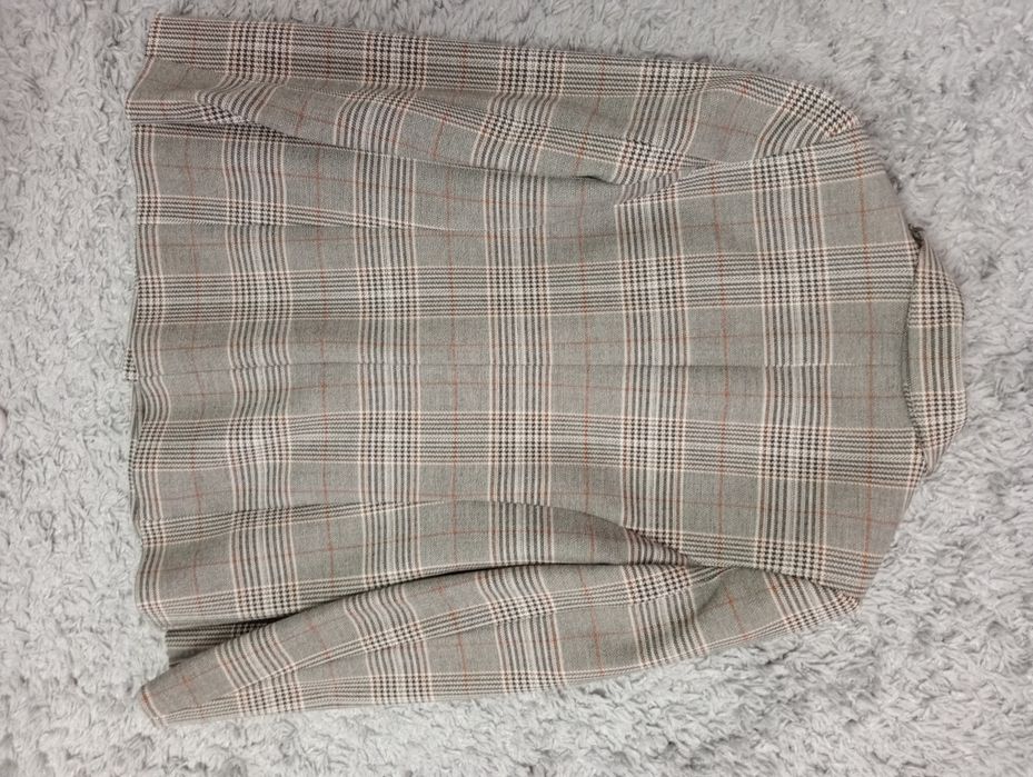 Жіночий піджак 42 розміру