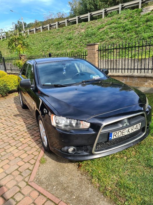 Ładny Lancer 1.8 143km