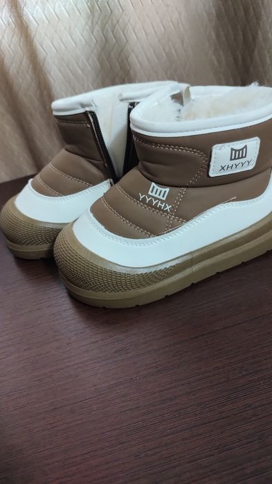 Теплі зимові чоботи