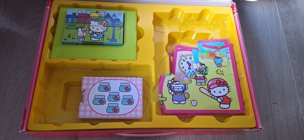 Układanki puzzle hello kitty&frozen