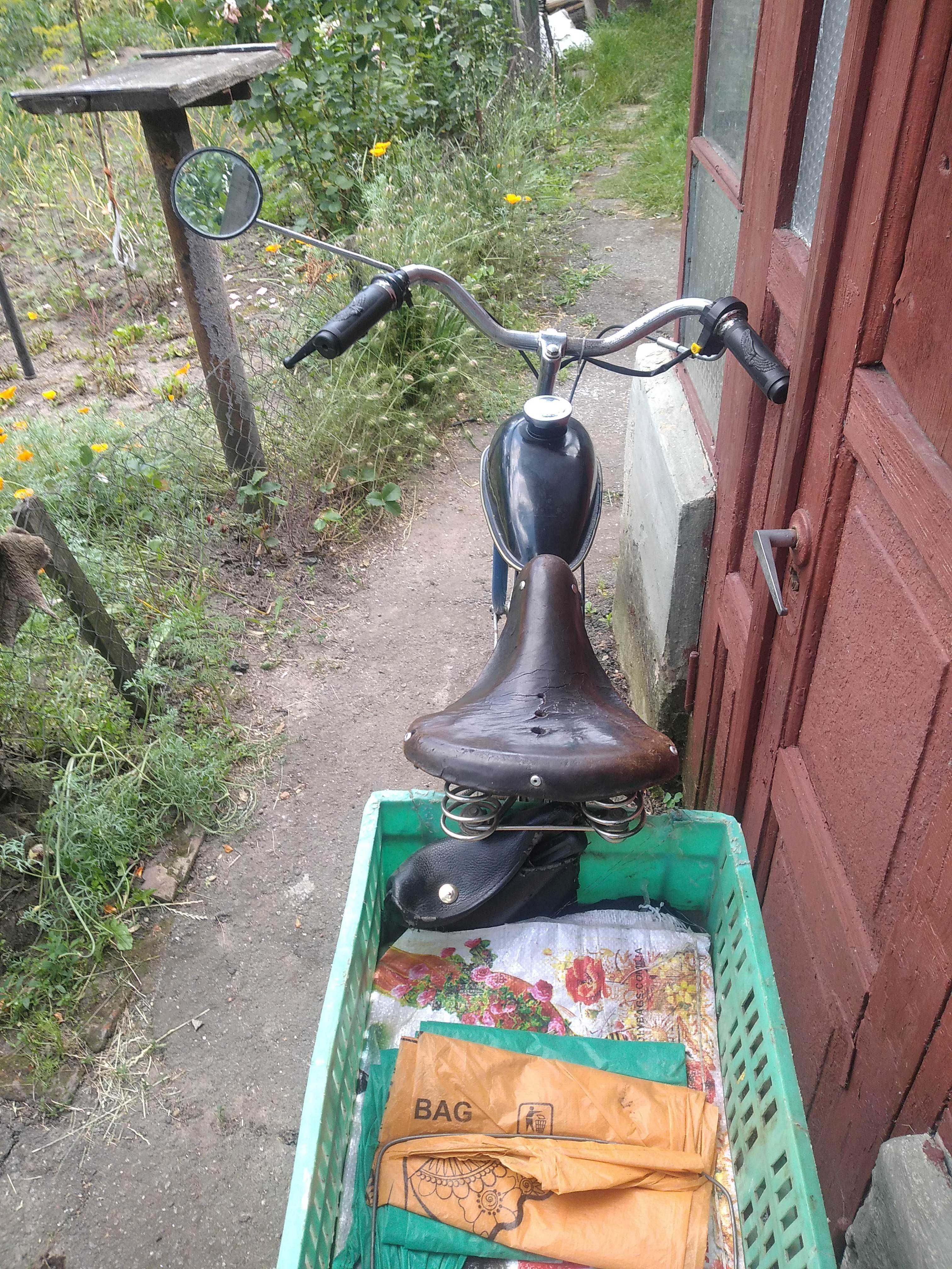 Велосипед з двигуном 'дирчик'