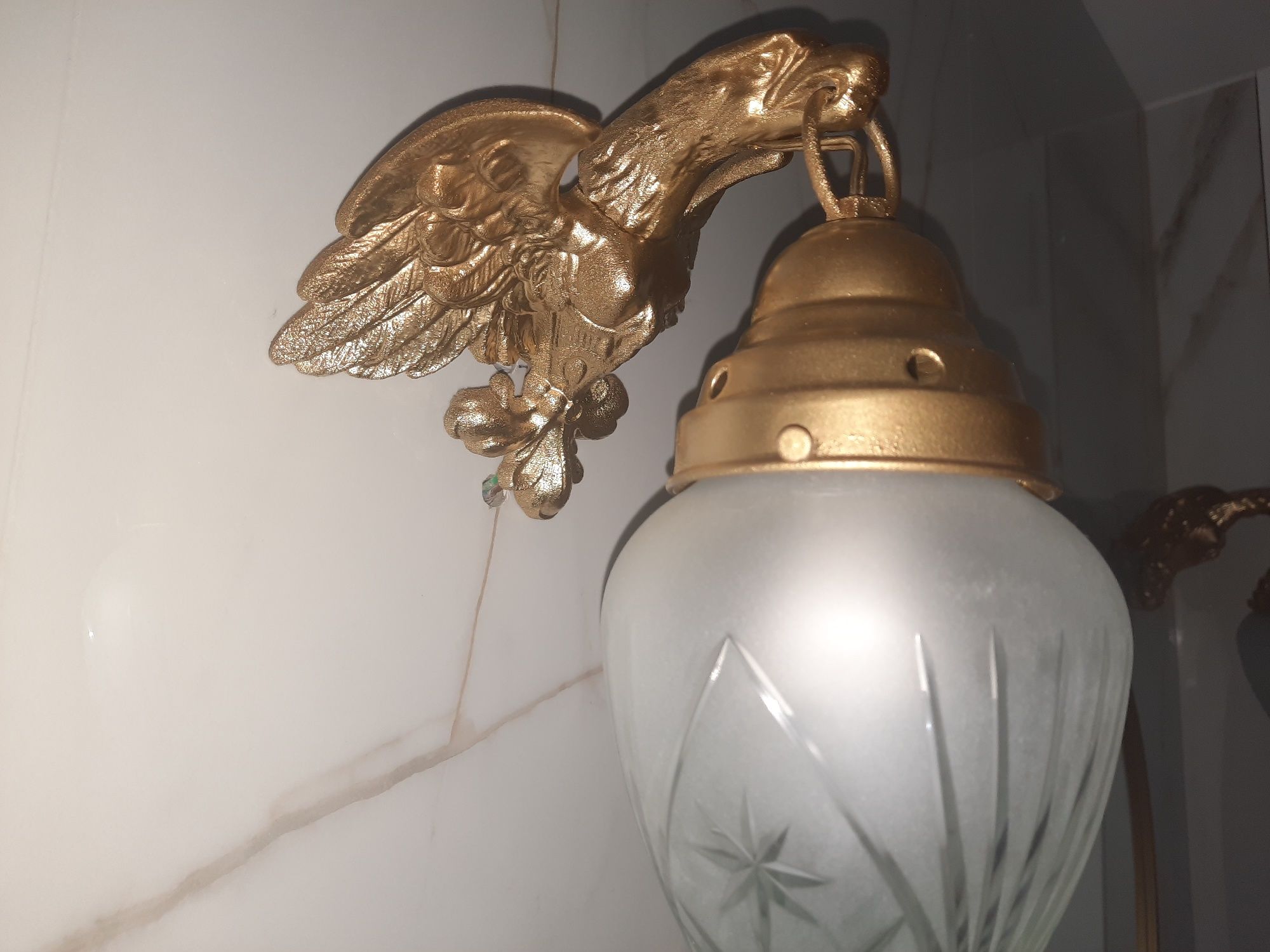 Żyrandol lampa  kinkiety mosiężne orły złote klosze kryształyowe