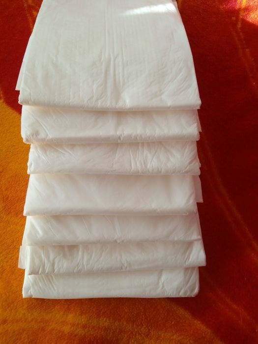 Одноразовые пеленки и памперсы