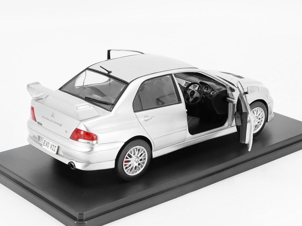 Mitsubishi Lancer Evolution VII (2001) масштаб 1:24 - WHITEBOX